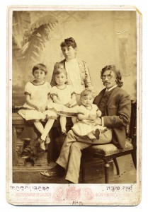 Sholem Aleichem, his wife Olga, and their three children, Tissa, Lyala (Bel Kaufman’s mother), and Emma, Kiev, 1889. The family portrait was used as a Rosh Hashana greeting card (see Hebrew inscription at bottom). (YIVO Archives) 