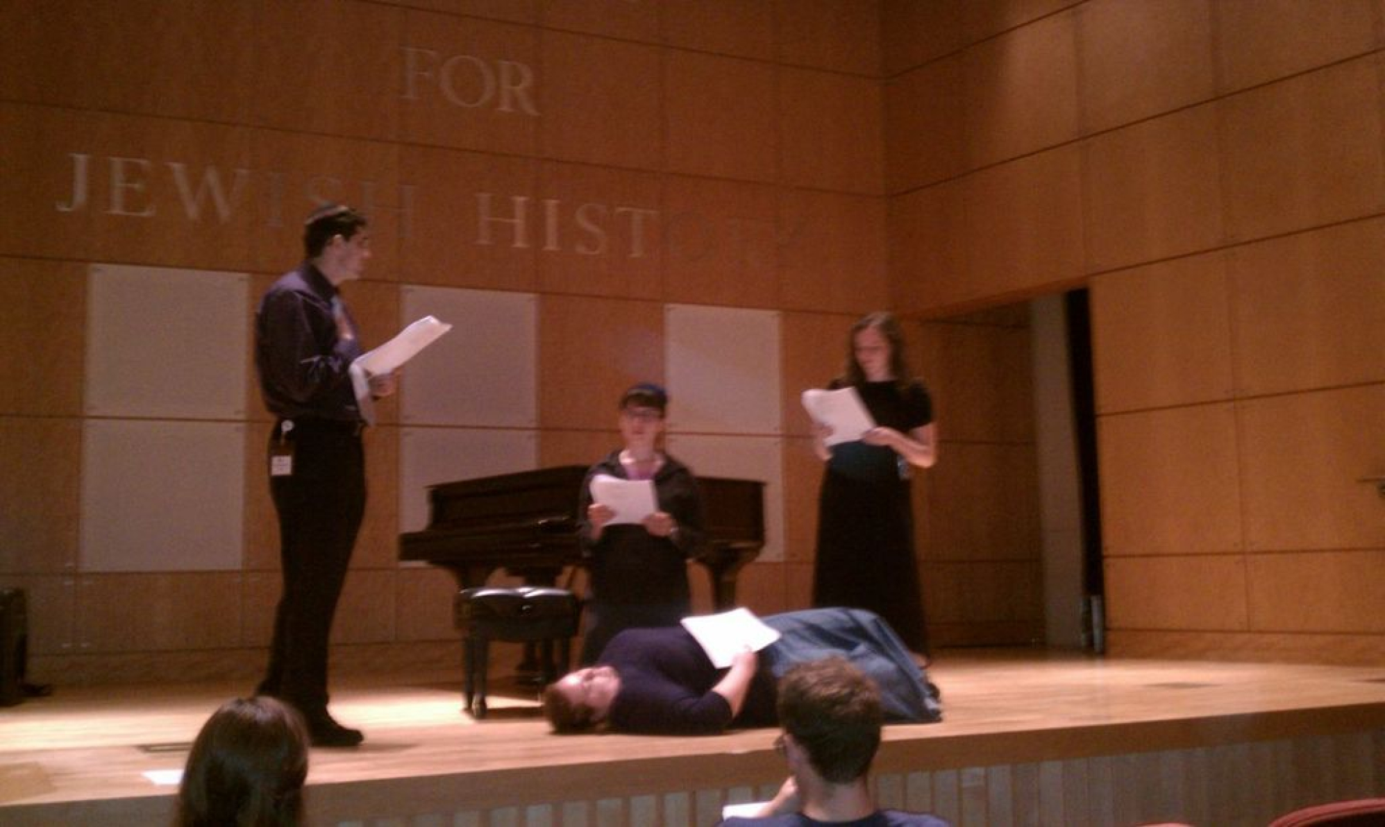 Members of the Elementary class participating in a Yiddish song workshop led by Josh Waletzky.